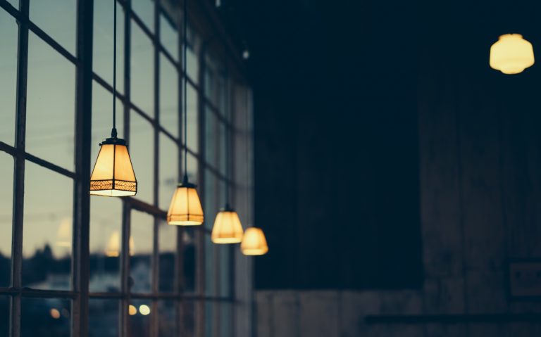 a group of lamps on a wall