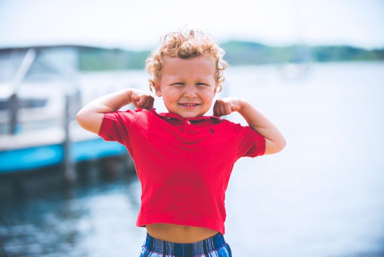 a child in a red shirt