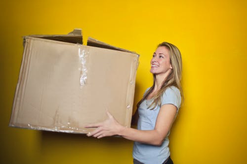 a person holding a box