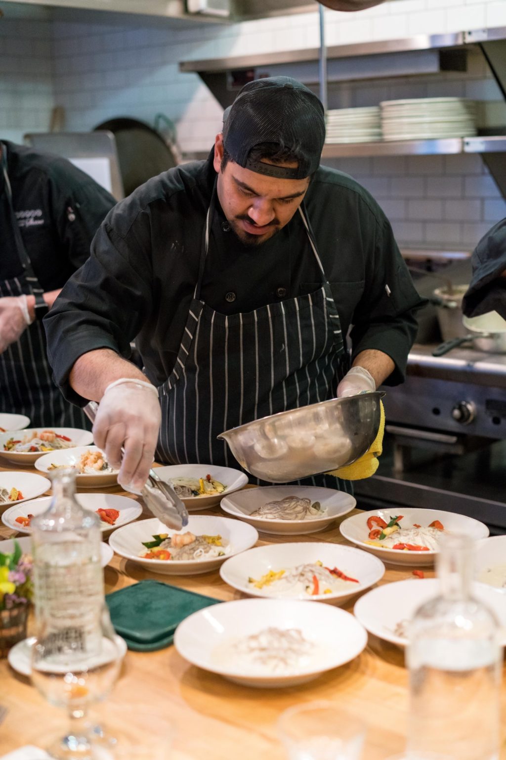 a man making food in a kitchen
