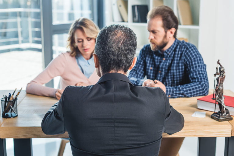 a group of people sitting at a table