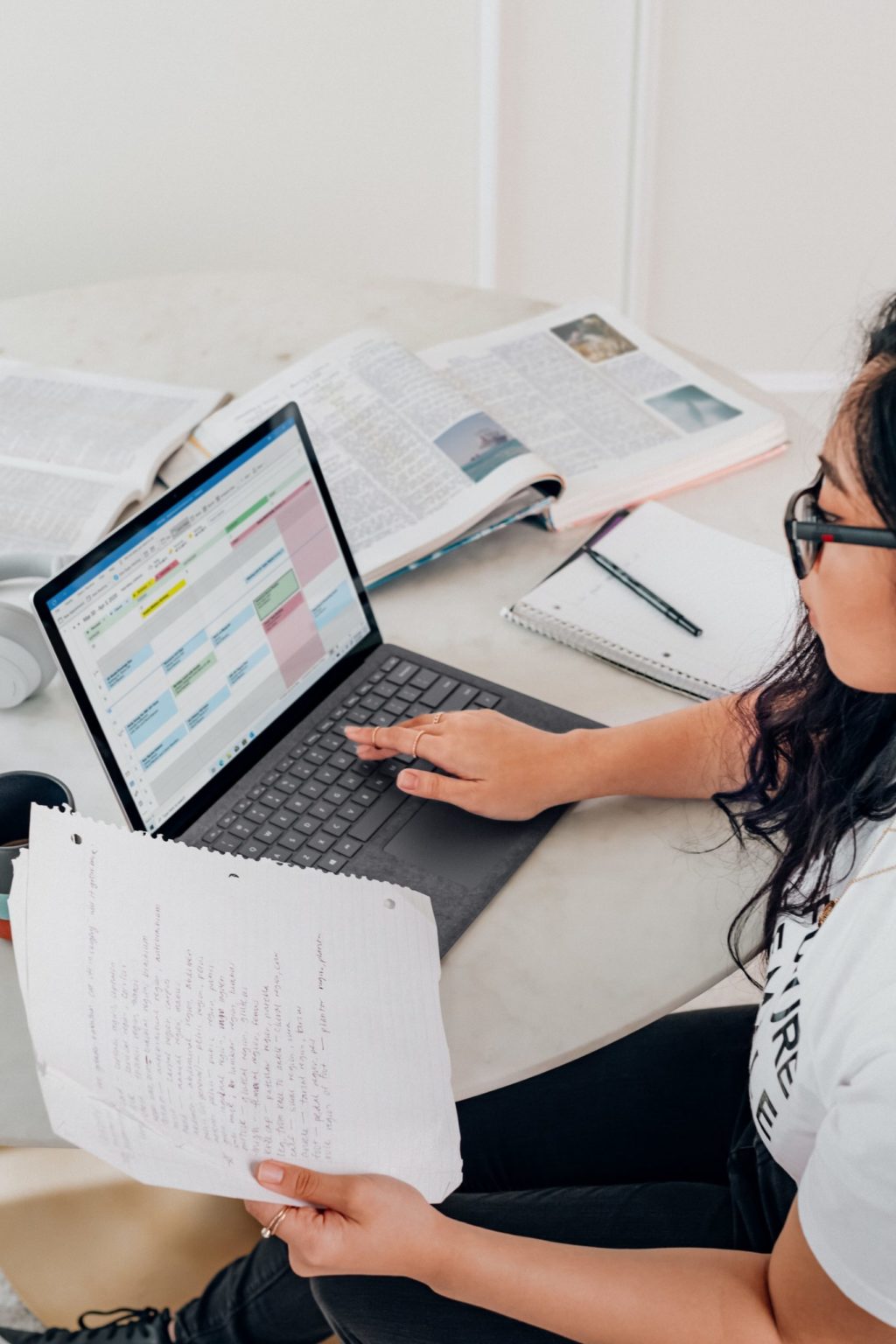 a woman working on a laptop